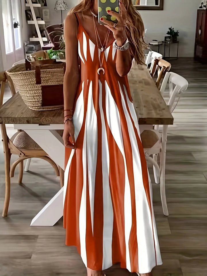 👗✨ Randig maxiklänning med spagettiband och hög midja