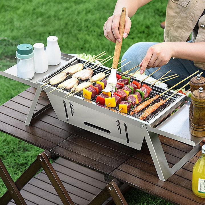🔥Den hopfällbara utomhusgrillen i rostfritt stål